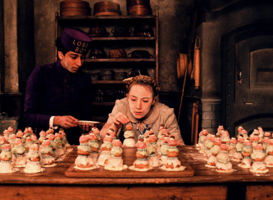 Agatha making Courtesan au Chocolat in the kitchen, Zero beside her.