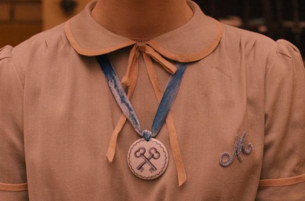 Agatha’s Society of the Crossed Keys necklace.