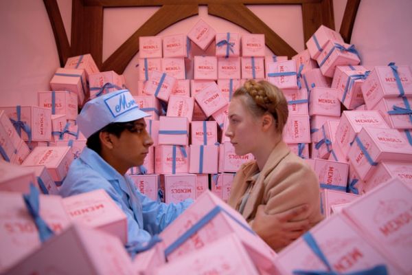 Zero and Agatha amidst boxes of Mendl’s Patisserie.