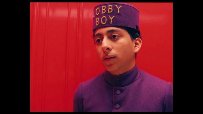 Zero inside the Grand Budapest Hotel’s elevator.